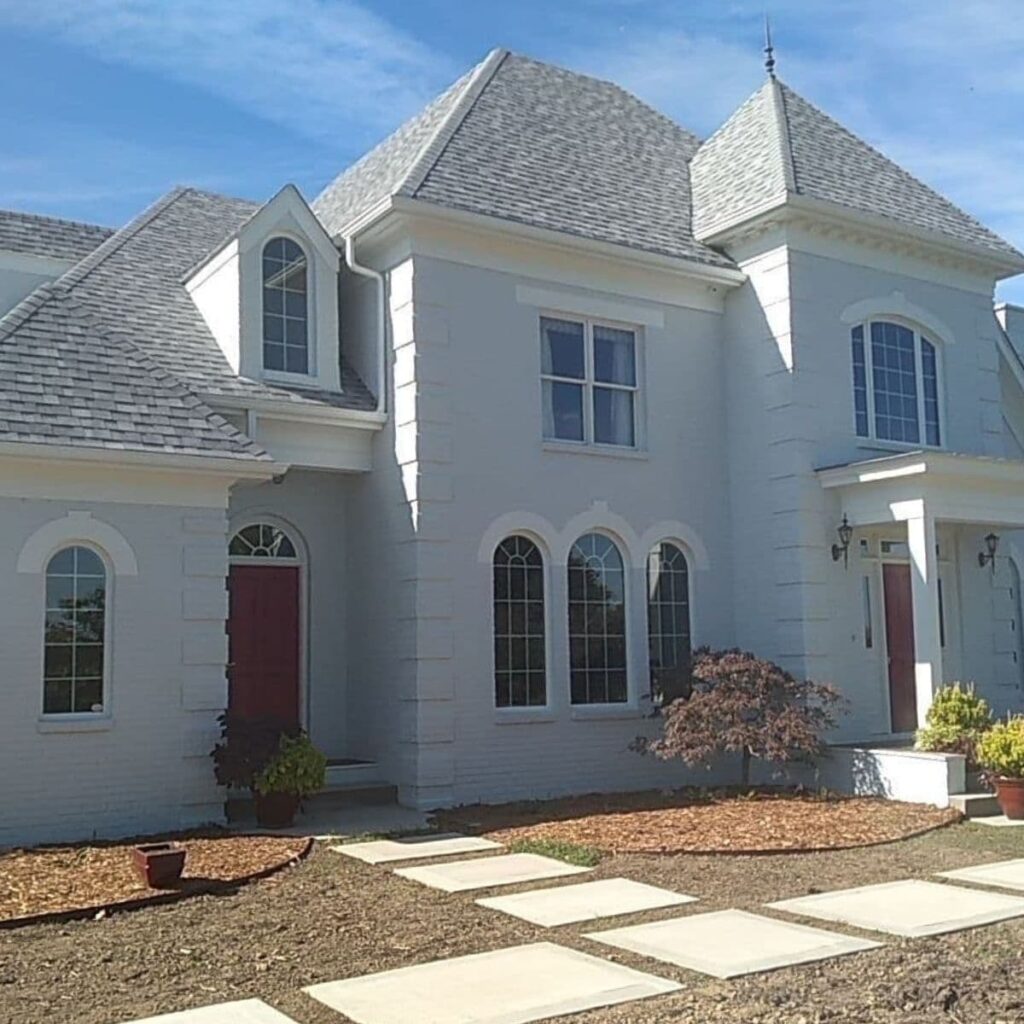 stucco on a home with a fresh coat of paint