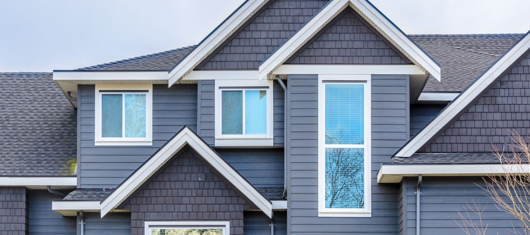 siding on a home with fresh coat of paint